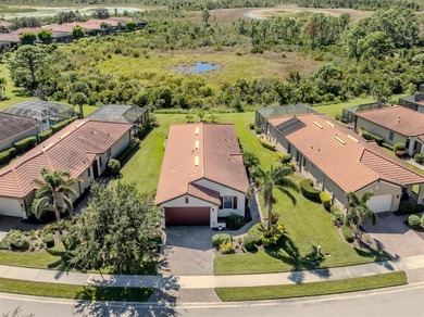 This meticulously maintained, WCI-built residence nestled in the on Sarasota National Golf Club in Florida - for sale on GolfHomes.com, golf home, golf lot