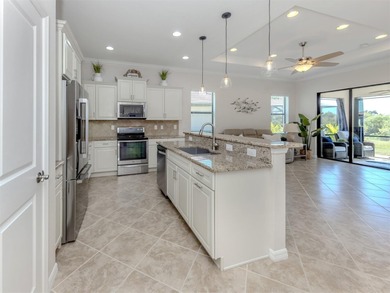This meticulously maintained, WCI-built residence nestled in the on Sarasota National Golf Club in Florida - for sale on GolfHomes.com, golf home, golf lot