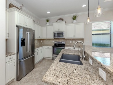 This meticulously maintained, WCI-built residence nestled in the on Sarasota National Golf Club in Florida - for sale on GolfHomes.com, golf home, golf lot