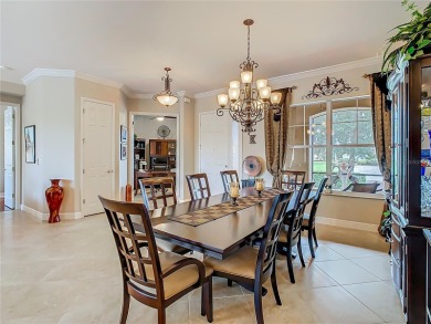 ABSOLUTELY STUNNING Operetta model with a SALT WATER POOL on a on Poinciana Golf Club in Florida - for sale on GolfHomes.com, golf home, golf lot