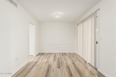 Fully updated Sun City home offering 3 bedrooms, 2 baths, and 1 on Sun City Lakes West and East in Arizona - for sale on GolfHomes.com, golf home, golf lot