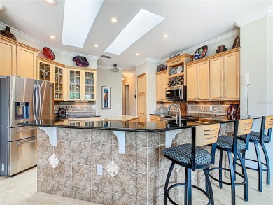 ABSOLUTELY STUNNING Operetta model with a SALT WATER POOL on a on Poinciana Golf Club in Florida - for sale on GolfHomes.com, golf home, golf lot