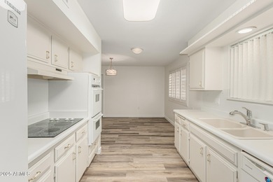 Fully updated Sun City home offering 3 bedrooms, 2 baths, and 1 on Sun City Lakes West and East in Arizona - for sale on GolfHomes.com, golf home, golf lot