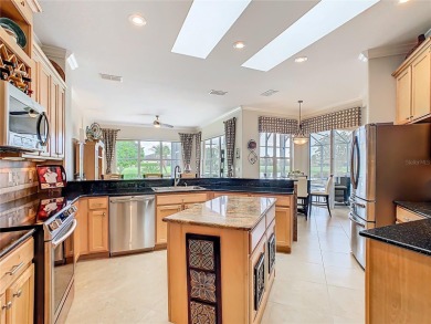 ABSOLUTELY STUNNING Operetta model with a SALT WATER POOL on a on Poinciana Golf Club in Florida - for sale on GolfHomes.com, golf home, golf lot