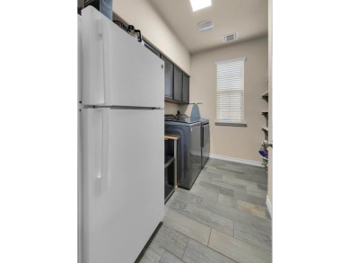 5-bedroom, 3.5-bath home in the popular master-planned community on Twin Rivers Golf Club in Texas - for sale on GolfHomes.com, golf home, golf lot