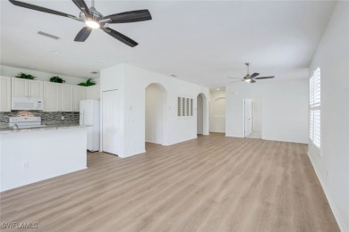 Welcome home to this beautiful and bright first-floor, corner on Spanish Wells Golf and Country Club in Florida - for sale on GolfHomes.com, golf home, golf lot