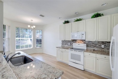 Welcome home to this beautiful and bright first-floor, corner on Spanish Wells Golf and Country Club in Florida - for sale on GolfHomes.com, golf home, golf lot