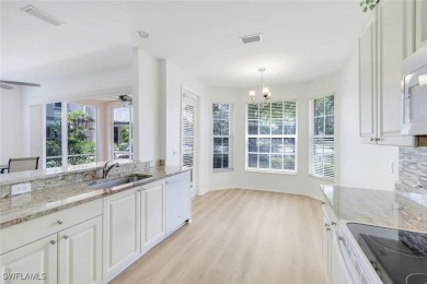 Welcome home to this beautiful and bright first-floor, corner on Spanish Wells Golf and Country Club in Florida - for sale on GolfHomes.com, golf home, golf lot