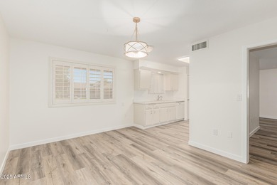 Fully updated Sun City home offering 3 bedrooms, 2 baths, and 1 on Sun City Lakes West and East in Arizona - for sale on GolfHomes.com, golf home, golf lot