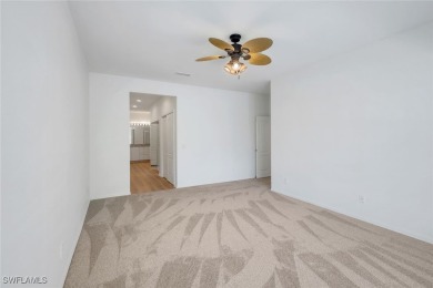 Welcome home to this beautiful and bright first-floor, corner on Spanish Wells Golf and Country Club in Florida - for sale on GolfHomes.com, golf home, golf lot