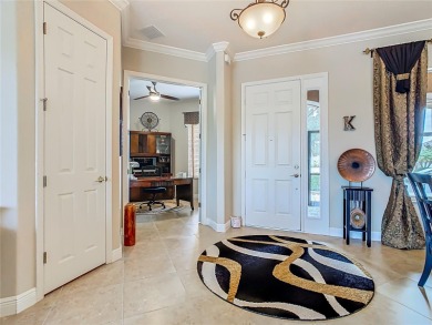 ABSOLUTELY STUNNING Operetta model with a SALT WATER POOL on a on Poinciana Golf Club in Florida - for sale on GolfHomes.com, golf home, golf lot