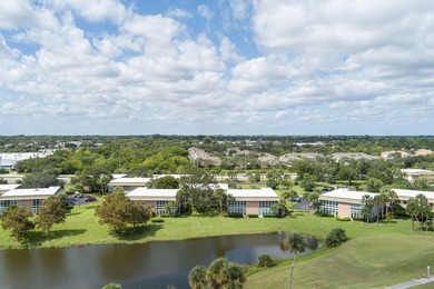 Enhance your lifestyle in Vista Gardens, a highly sought-after on Vero Beach South Golf Course in Florida - for sale on GolfHomes.com, golf home, golf lot