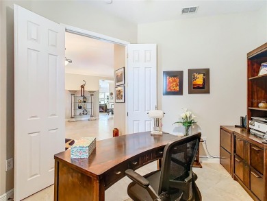 ABSOLUTELY STUNNING Operetta model with a SALT WATER POOL on a on Poinciana Golf Club in Florida - for sale on GolfHomes.com, golf home, golf lot