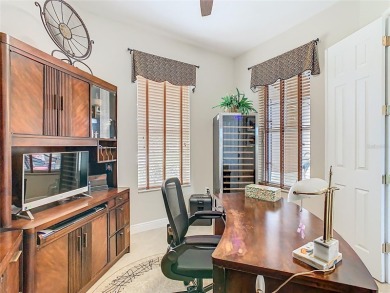 ABSOLUTELY STUNNING Operetta model with a SALT WATER POOL on a on Poinciana Golf Club in Florida - for sale on GolfHomes.com, golf home, golf lot