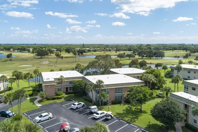 Enhance your lifestyle in Vista Gardens, a highly sought-after on Vero Beach South Golf Course in Florida - for sale on GolfHomes.com, golf home, golf lot