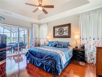 ABSOLUTELY STUNNING Operetta model with a SALT WATER POOL on a on Poinciana Golf Club in Florida - for sale on GolfHomes.com, golf home, golf lot