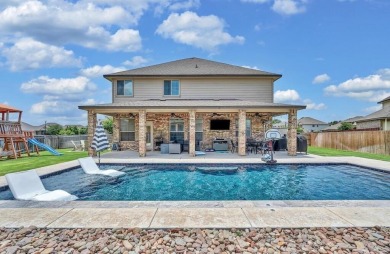 5-bedroom, 3.5-bath home in the popular master-planned community on Twin Rivers Golf Club in Texas - for sale on GolfHomes.com, golf home, golf lot