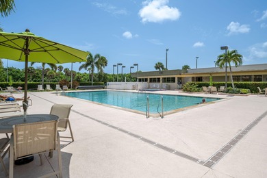 Enhance your lifestyle in Vista Gardens, a highly sought-after on Vero Beach South Golf Course in Florida - for sale on GolfHomes.com, golf home, golf lot