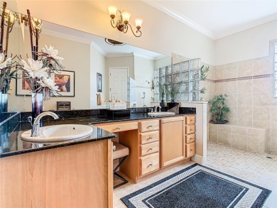 ABSOLUTELY STUNNING Operetta model with a SALT WATER POOL on a on Poinciana Golf Club in Florida - for sale on GolfHomes.com, golf home, golf lot