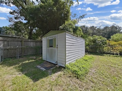 Under contract-accepting backup offers. Welcome home to this on Babe Zaharias Golf Course in Florida - for sale on GolfHomes.com, golf home, golf lot