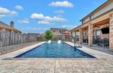 5-bedroom, 3.5-bath home in the popular master-planned community on Twin Rivers Golf Club in Texas - for sale on GolfHomes.com, golf home, golf lot