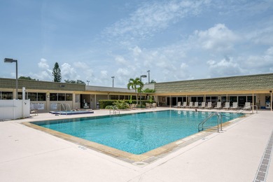 Enhance your lifestyle in Vista Gardens, a highly sought-after on Vero Beach South Golf Course in Florida - for sale on GolfHomes.com, golf home, golf lot
