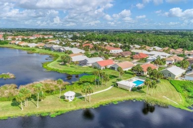 Gorgeous lakefront 3 bedroom home with multiple updates and on Capri Isle Golf Club in Florida - for sale on GolfHomes.com, golf home, golf lot