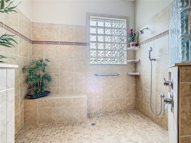 ABSOLUTELY STUNNING Operetta model with a SALT WATER POOL on a on Poinciana Golf Club in Florida - for sale on GolfHomes.com, golf home, golf lot