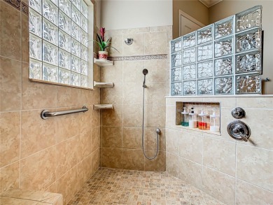 ABSOLUTELY STUNNING Operetta model with a SALT WATER POOL on a on Poinciana Golf Club in Florida - for sale on GolfHomes.com, golf home, golf lot