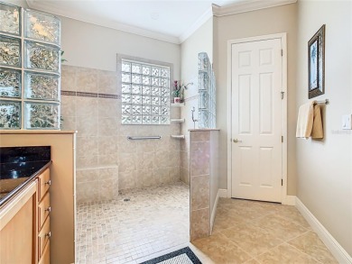 ABSOLUTELY STUNNING Operetta model with a SALT WATER POOL on a on Poinciana Golf Club in Florida - for sale on GolfHomes.com, golf home, golf lot