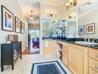 ABSOLUTELY STUNNING Operetta model with a SALT WATER POOL on a on Poinciana Golf Club in Florida - for sale on GolfHomes.com, golf home, golf lot
