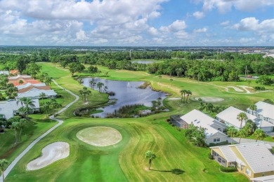 Gorgeous lakefront 3 bedroom home with multiple updates and on Capri Isle Golf Club in Florida - for sale on GolfHomes.com, golf home, golf lot