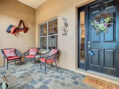 ABSOLUTELY STUNNING Operetta model with a SALT WATER POOL on a on Poinciana Golf Club in Florida - for sale on GolfHomes.com, golf home, golf lot