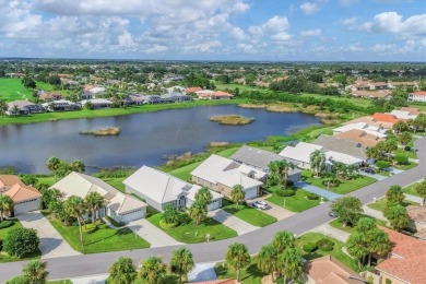 Gorgeous lakefront 3 bedroom home with multiple updates and on Capri Isle Golf Club in Florida - for sale on GolfHomes.com, golf home, golf lot