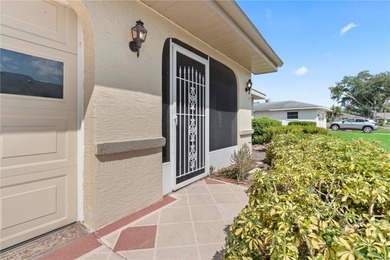 Welcome home to this spacious 2-bedroom, 2-bath residence that on Falcon Watch Golf Club in Florida - for sale on GolfHomes.com, golf home, golf lot