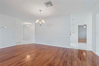 Welcome home to this spacious 2-bedroom, 2-bath residence that on Falcon Watch Golf Club in Florida - for sale on GolfHomes.com, golf home, golf lot