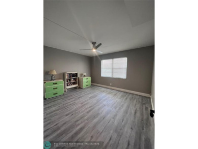 WELCOME TO THIS BEAUTIFUL RENOVATED CONDO! Come enjoy a Country on Wynmoor Golf Course in Florida - for sale on GolfHomes.com, golf home, golf lot