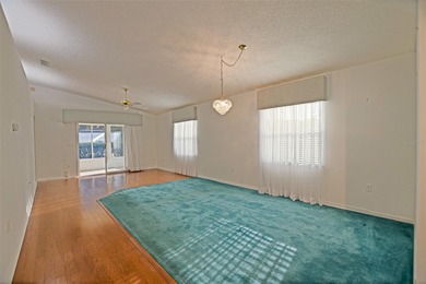 Discover the Florida lifestyle in Spruce Creek South, a gated on The Links of Spruce Creek in Florida - for sale on GolfHomes.com, golf home, golf lot