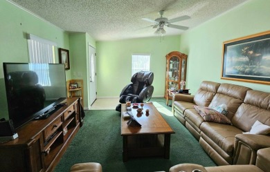 This home is on leased land. Buyers do not own the land. This on Big Cypress Golf and Country Club in Florida - for sale on GolfHomes.com, golf home, golf lot