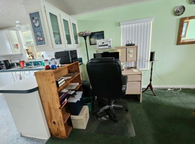 This home is on leased land. Buyers do not own the land. This on Big Cypress Golf and Country Club in Florida - for sale on GolfHomes.com, golf home, golf lot