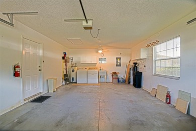 Discover the Florida lifestyle in Spruce Creek South, a gated on The Links of Spruce Creek in Florida - for sale on GolfHomes.com, golf home, golf lot