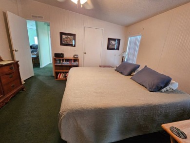 This home is on leased land. Buyers do not own the land. This on Big Cypress Golf and Country Club in Florida - for sale on GolfHomes.com, golf home, golf lot