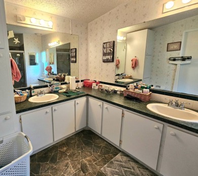 This home is on leased land. Buyers do not own the land. This on Big Cypress Golf and Country Club in Florida - for sale on GolfHomes.com, golf home, golf lot