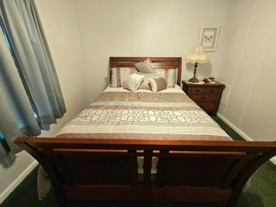 This home is on leased land. Buyers do not own the land. This on Big Cypress Golf and Country Club in Florida - for sale on GolfHomes.com, golf home, golf lot