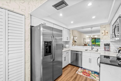 1st Floor Stunning Condo w/ Lake & Golf Views*The Contemporary on Boca Delray Golf and Country Club in Florida - for sale on GolfHomes.com, golf home, golf lot