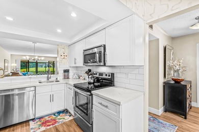 1st Floor Stunning Condo w/ Lake & Golf Views*The Contemporary on Boca Delray Golf and Country Club in Florida - for sale on GolfHomes.com, golf home, golf lot