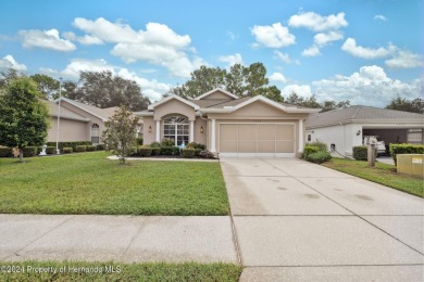 Easy, breezy Florida living? You betcha! This lovely Silverthorn on Silverthorn Country Club in Florida - for sale on GolfHomes.com, golf home, golf lot