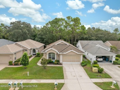 Easy, breezy Florida living? You betcha! This lovely Silverthorn on Silverthorn Country Club in Florida - for sale on GolfHomes.com, golf home, golf lot