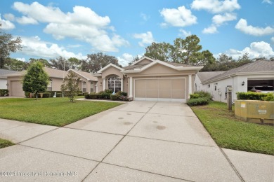 Easy, breezy Florida living? You betcha! This lovely Silverthorn on Silverthorn Country Club in Florida - for sale on GolfHomes.com, golf home, golf lot