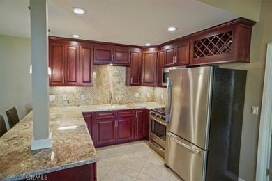 Absolutely gorgeous open floor plan.  Beautiful kitchen granite on Friendly Valley Golf Course in California - for sale on GolfHomes.com, golf home, golf lot